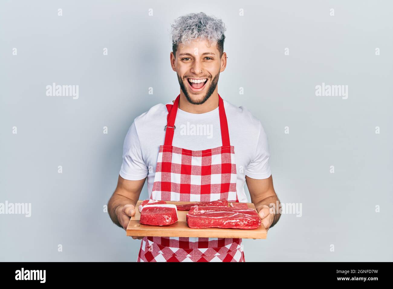 Man Holding Charal Biftecks - Delicious French Meat Editorial