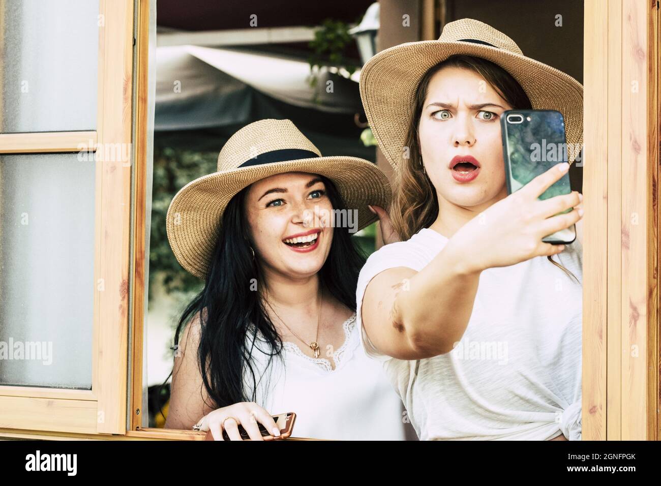 Video two beautiful women using hi-res stock photography and images - Alamy