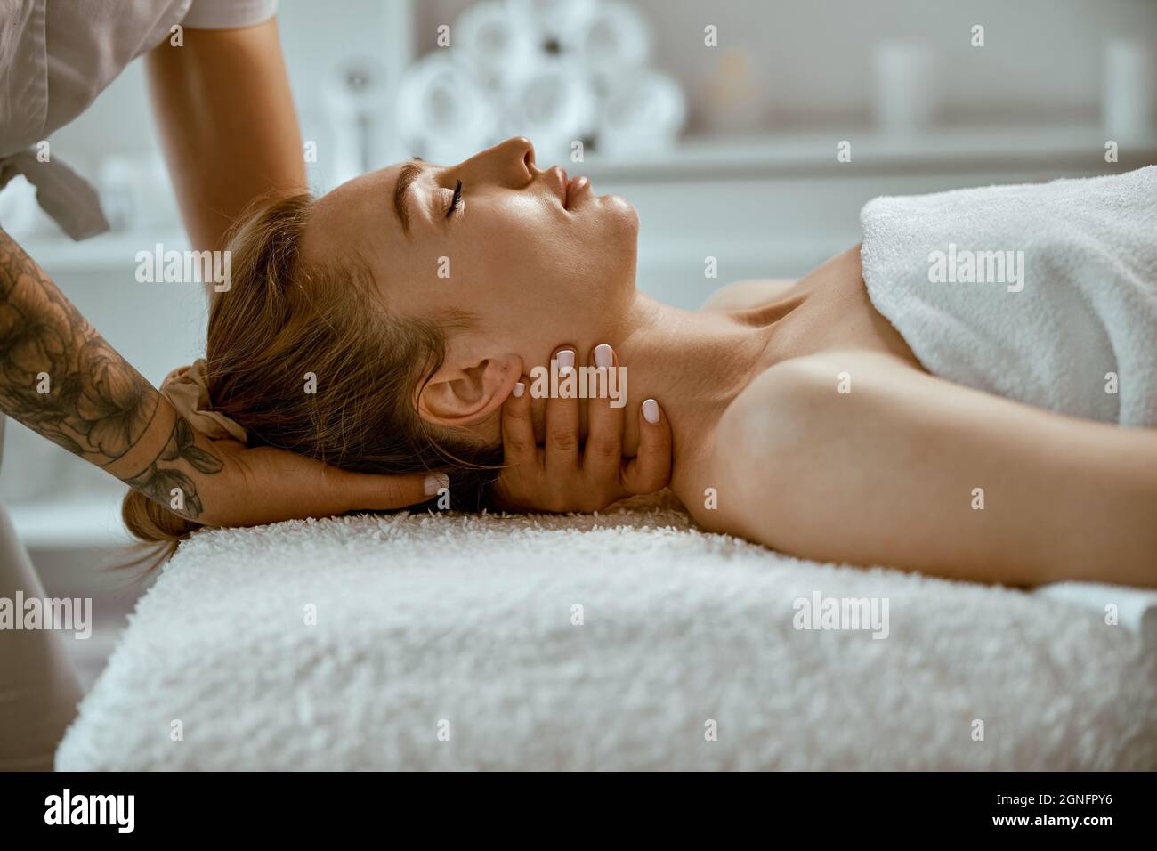 Shoulder and Neck Massage for Woman in Spa Salon. Stock Image