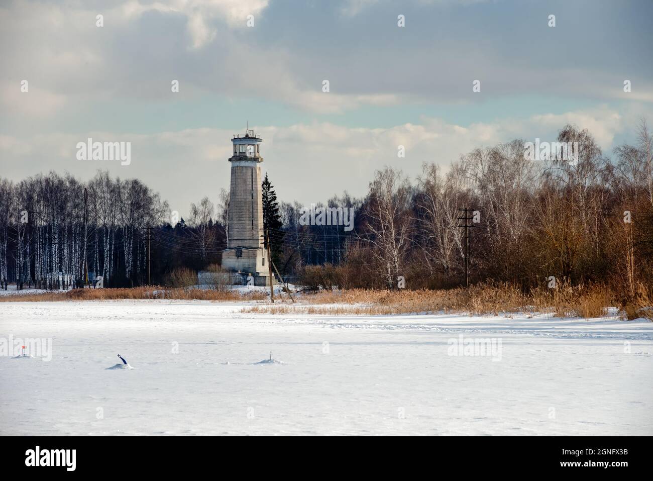A view on a winter day at Big Volzhsky lighthouse on the river. Dubna city, Moscow region, Russia. Stock Photo