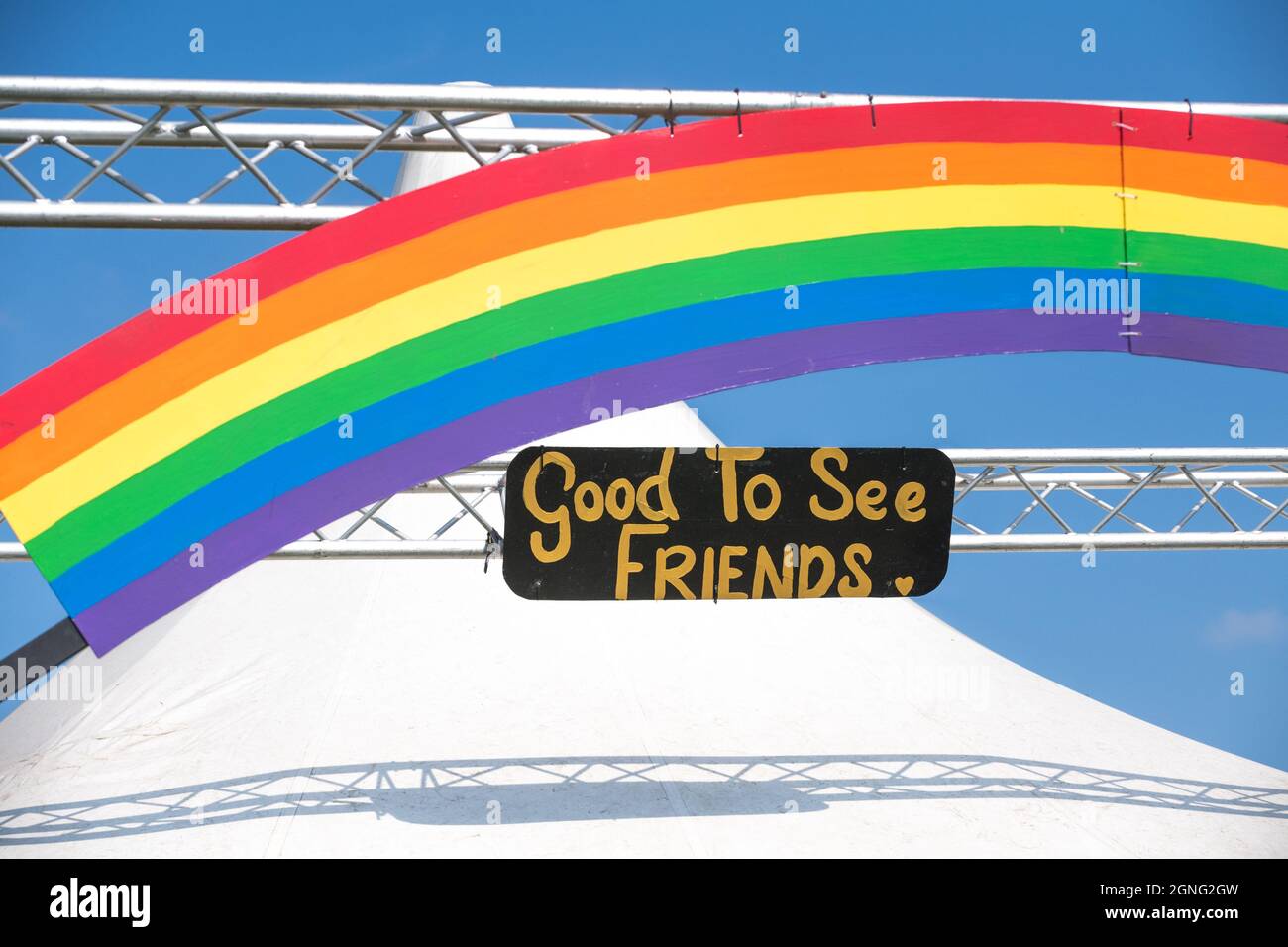 Rainbow and Good to See Friend sign at the 14th. International Roots and Acoustic Music at the Gate to Southwell music Festival. Stock Photo