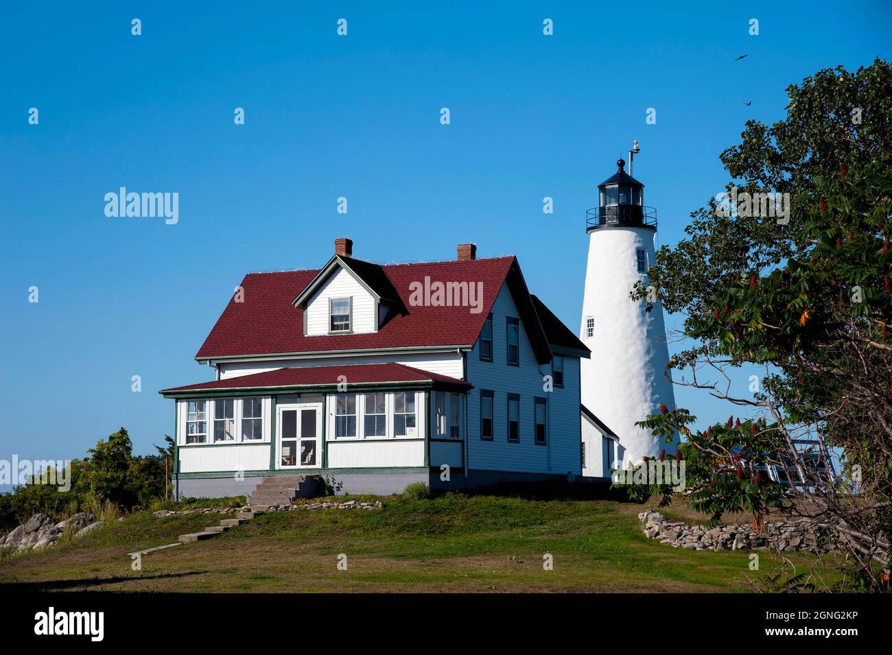 Reconstructed Bakers Island lighthouse and keeper dwelling for tourists to explore during the summer months, in Salem, Massachusetts. Stock Photo