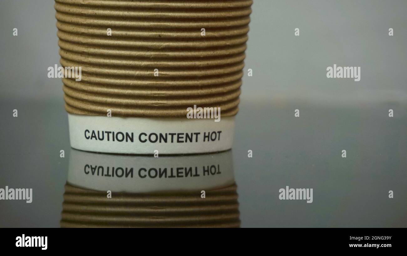 Disposable paper ribbed drinks cup, tiny Keep Britain Tidy logo and ...