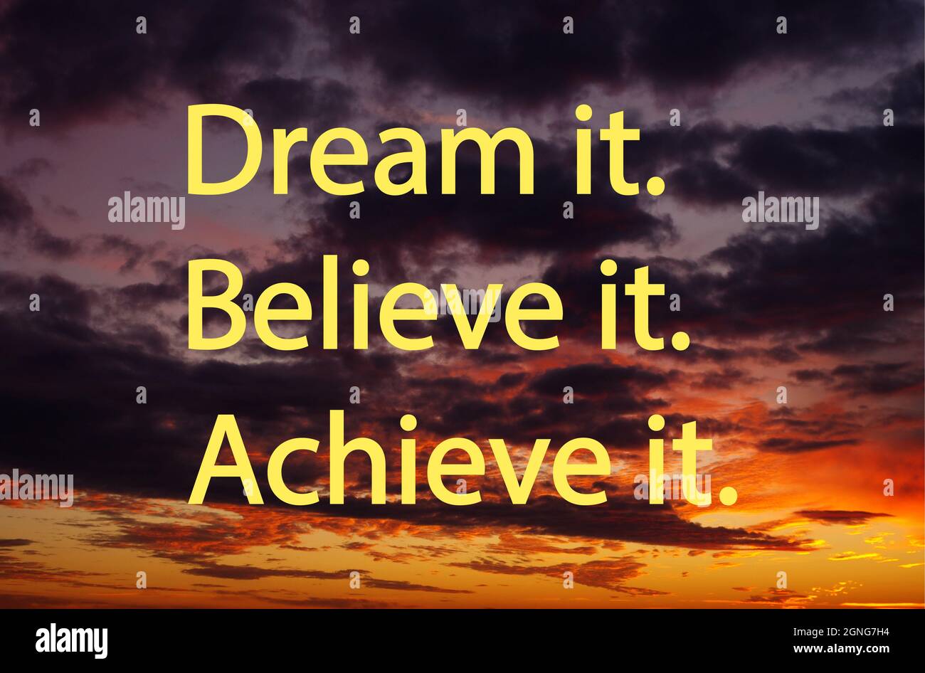 Dream it. Believe it. Achieve it. Motivation quotes. Beautiful sunset with sports motivation, positive mind. Dreams comes true. Inspirational and life Stock Photo