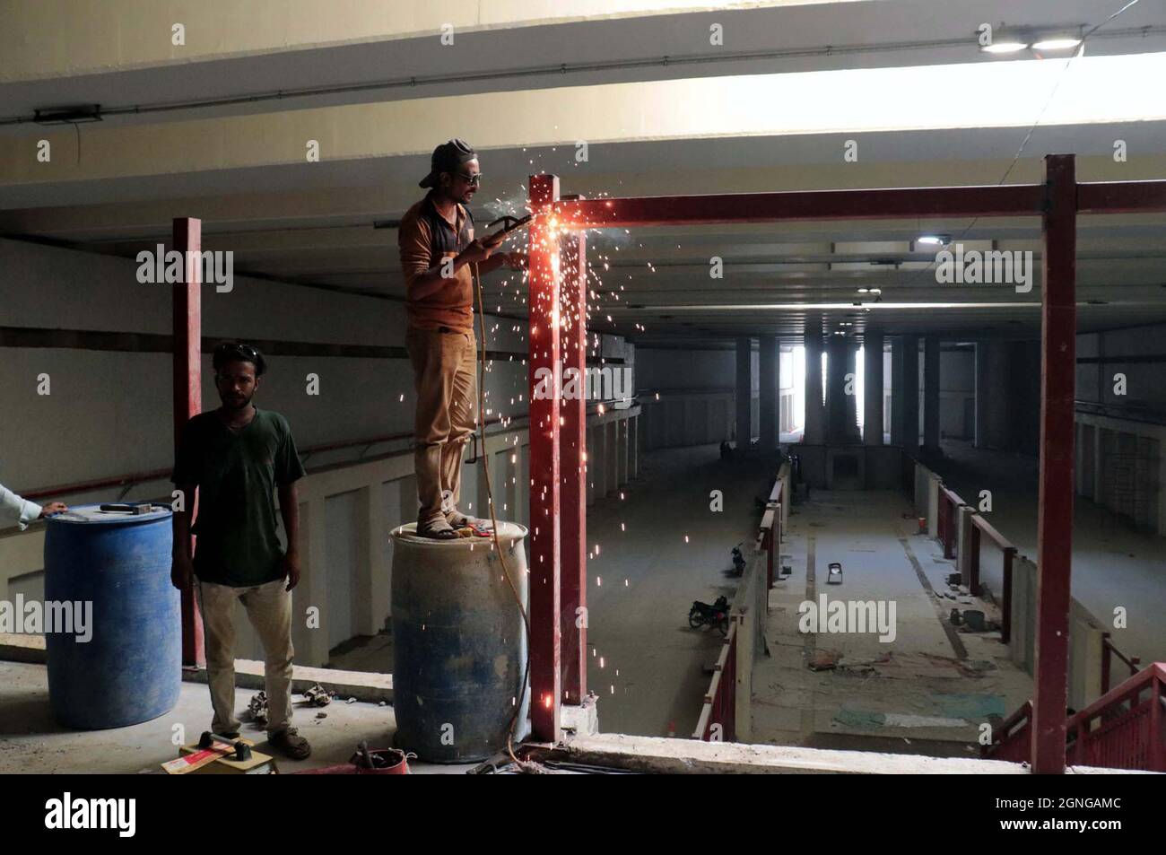 Construction work of Green Line Bus project is underway as slow pace of construction work is creating problems for residents and they demand to concerned department to complete work as soon as possible, at M.A Jinnah road in Karachi on Saturday, September 25, 2021. Stock Photo