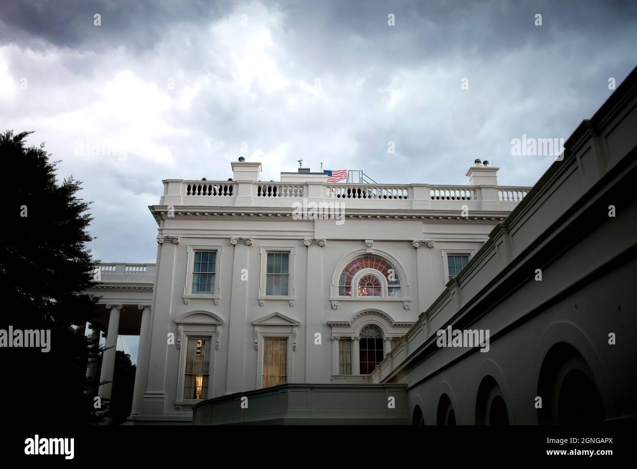 Storm clouds hang over the White House in Washington, DC, June 9, 2009. (Official White House Photo by Chuck Kennedy) This official White House photograph is being made available for publication by news organizations and/or for personal use printing by the subject(s) of the photograph. The photograph may not be manipulated in any way or used in materials, advertisements, products, or promotions that in any way suggest approval or endorsement of the President, the First Family, or the White House. Stock Photo
