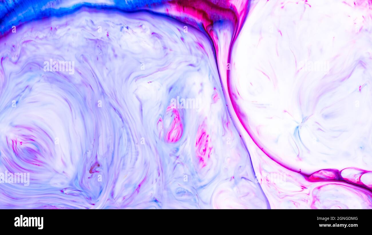 Fluid Art. Abstract liquid paint textured background with decorative spirals and swirls. Liquid pink blue backdrop. Trendy wallpaper Stock Photo