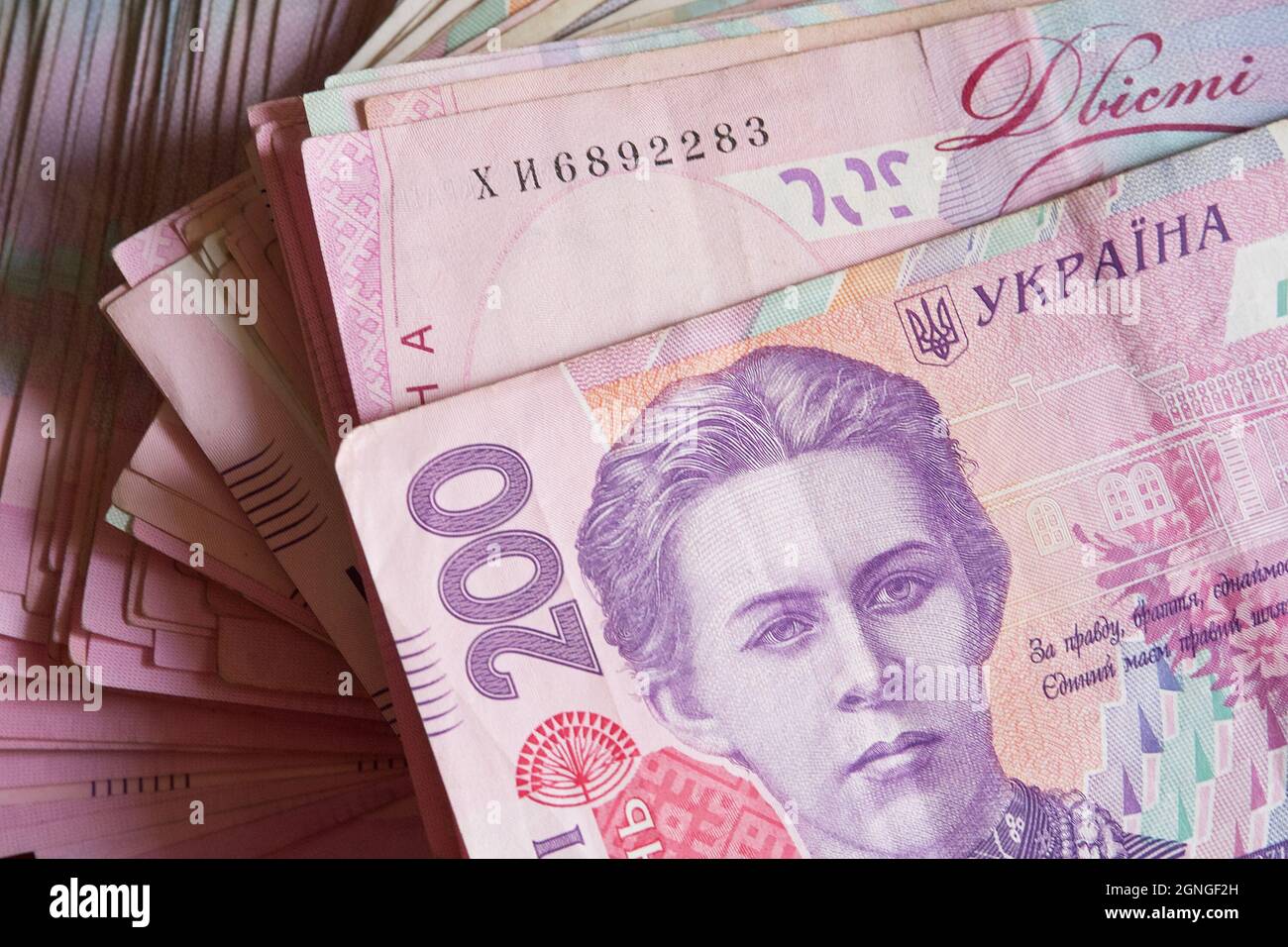 A bunch of banknotes with a face value of two hundred hryvnias. Ukrainian money. Stock Photo