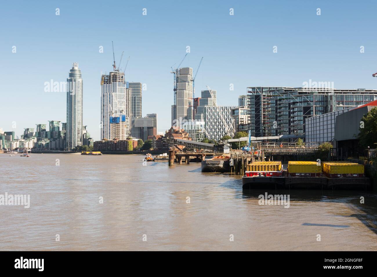 The River Thames at Nine Elms with high-rise development surrounding St George's Wharf Tower, London, England, UK Stock Photo