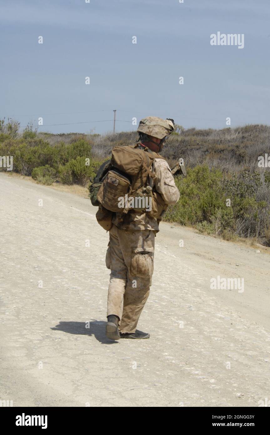 Recon Marine walks inland after securing beachhead at Camp Pendleton, California Stock Photo