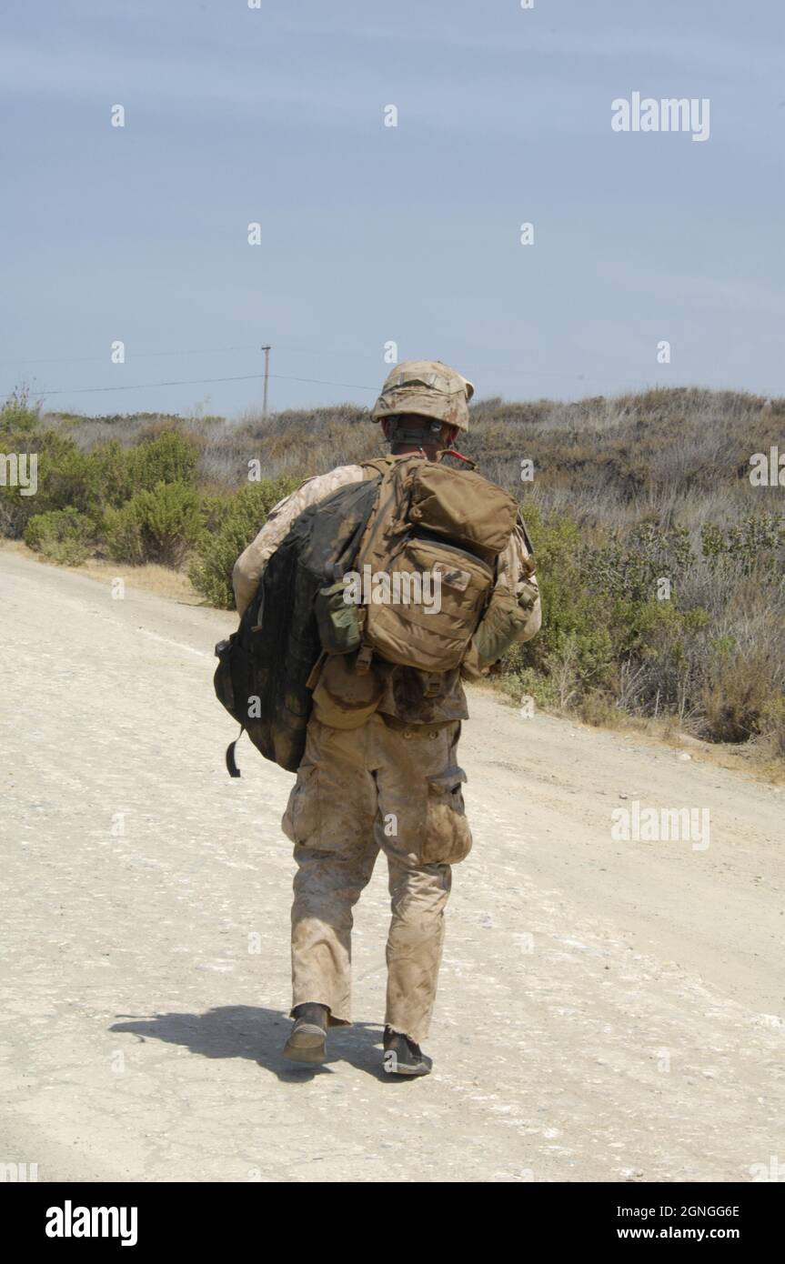 Recon Marine walks inland after securing beachhead at Camp Pendleton, California Stock Photo