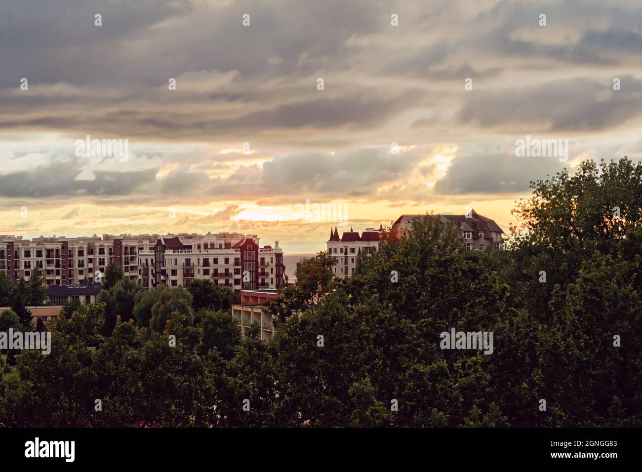 Residential area with ecological and sustainable green residential buildings, low-energy houses with apartments and green courtyard Stock Photo