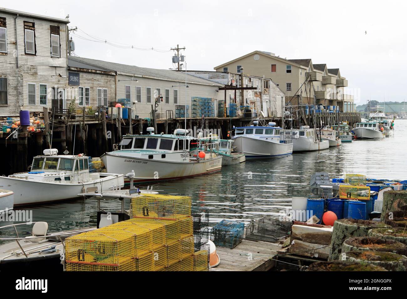 Lobster traps stacked on a wharf in Portland, Maine, USA Stock Photo