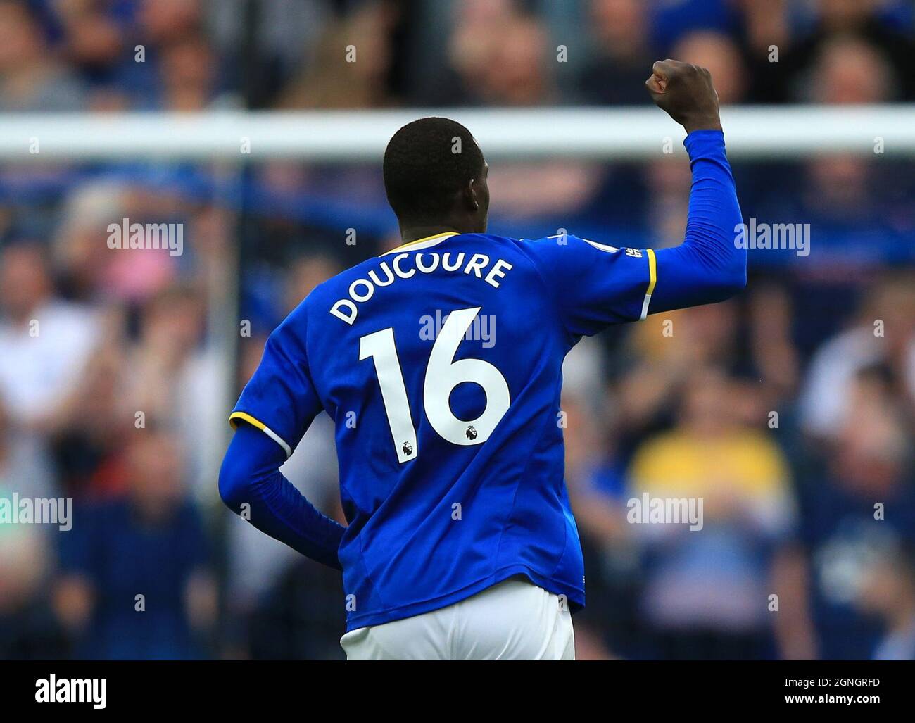 Goodison Park, Liverpool, UK. 25th Sep, 2021. Premier League football, Everton versus Norwich; Abdoulaye Doucoure of Everton raises his fist to salute the Everton supporters after scoring his team's second goal after 77 minutes Credit: Action Plus Sports/Alamy Live News Stock Photo