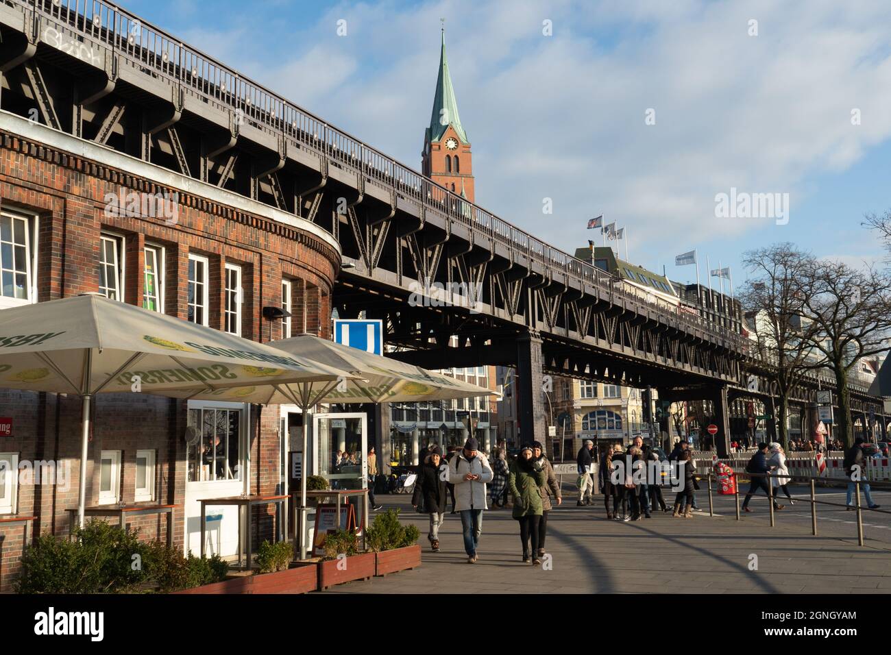 Hamburg, Germany - December 29th 2017: Metro station Landungsbruecken, in the background the French church Stock Photo