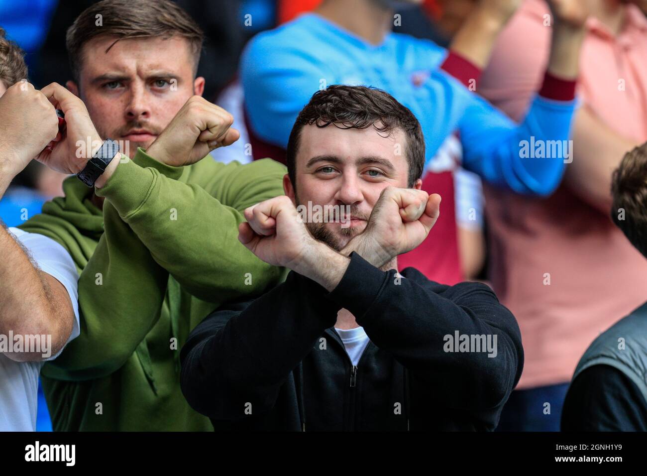 Ham fans make 'The Irons' sign before game Stock - Alamy