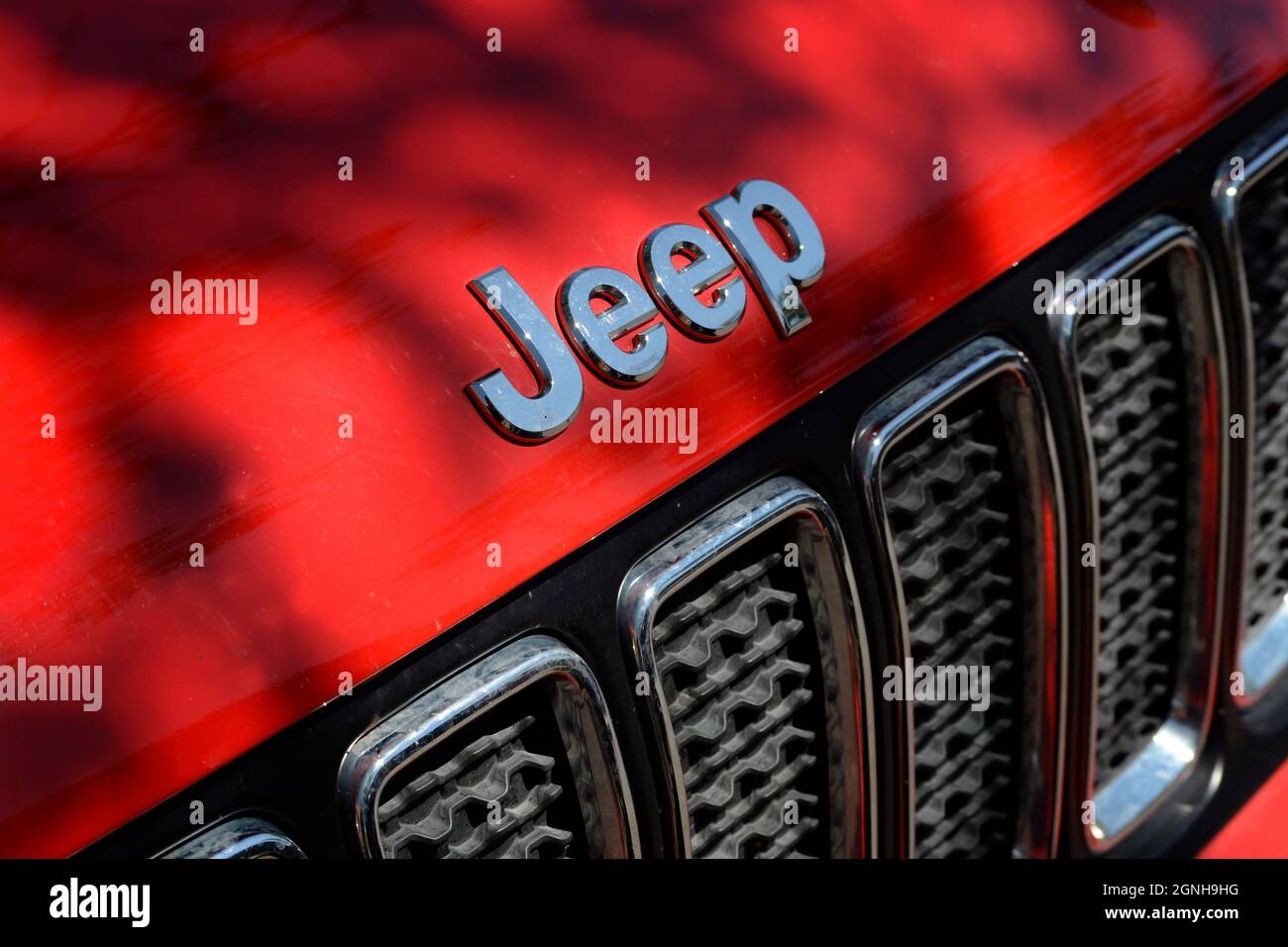 Closeup of the front of a Jeep automobile parked in Santa Fe, New
