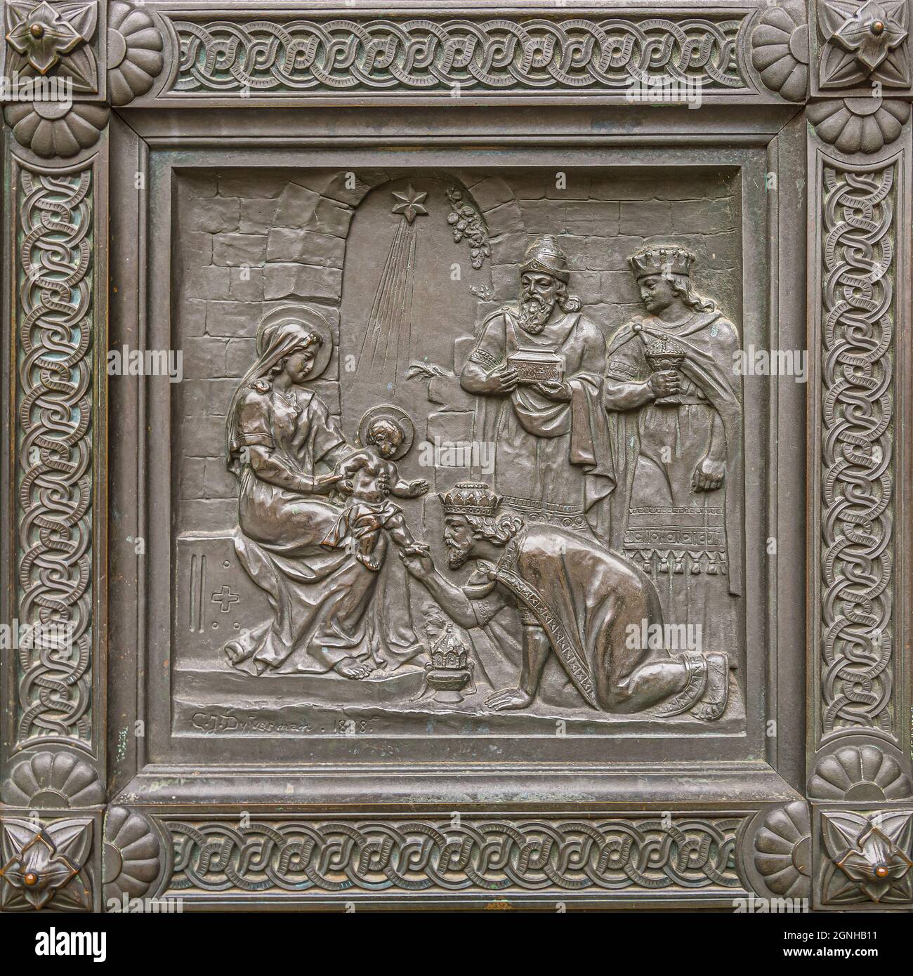 a bronze reliefe of the three vise men with their gifts to Jesus, a door in the cathedral of Lund, Sweden, September 11, 2021 Stock Photo