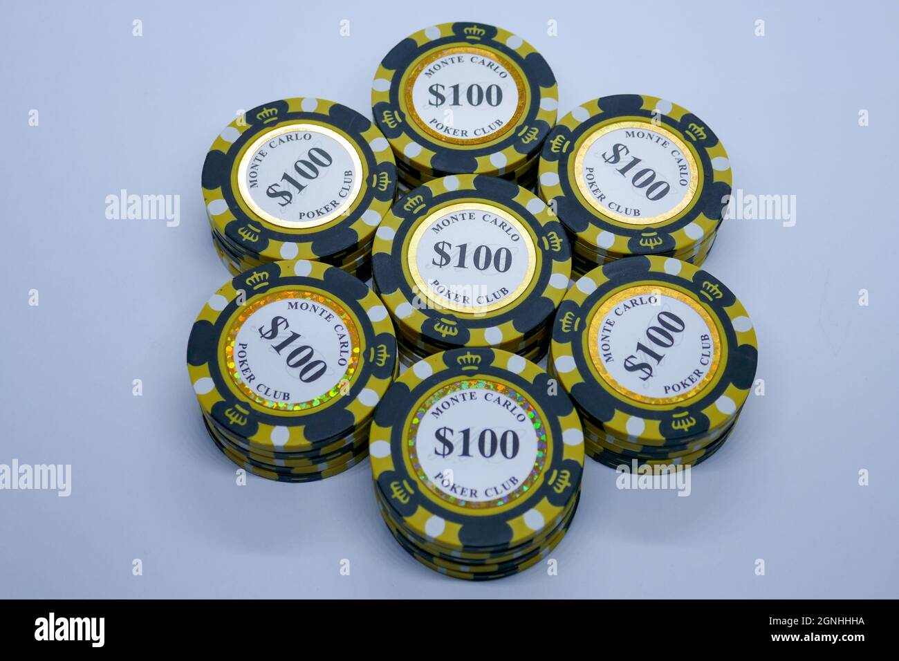 Stack of Gambling $100 tokens realistic casino chips, volumetric roulette and blackjack, sport poker money or cash. Gamble and success, winner and luc Stock Photo
