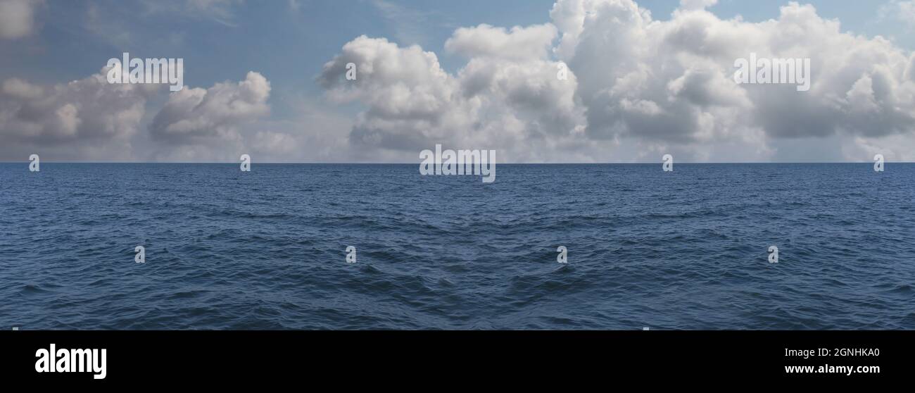 Panorama Smooth sea and blue sky in daytime with Clear air for design in your work concept. Stock Photo