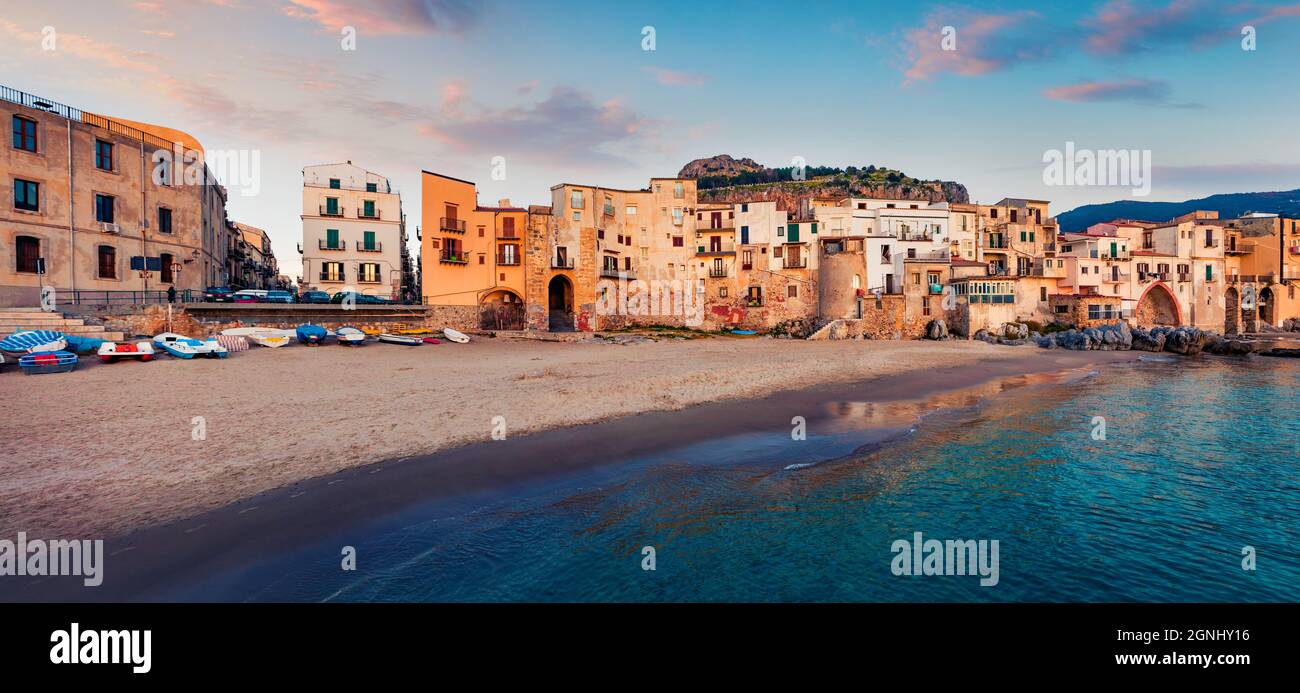 Superb spring cityscape of Cefalu town. Wonderful evening seascape of Mediterranean sea, Sicily