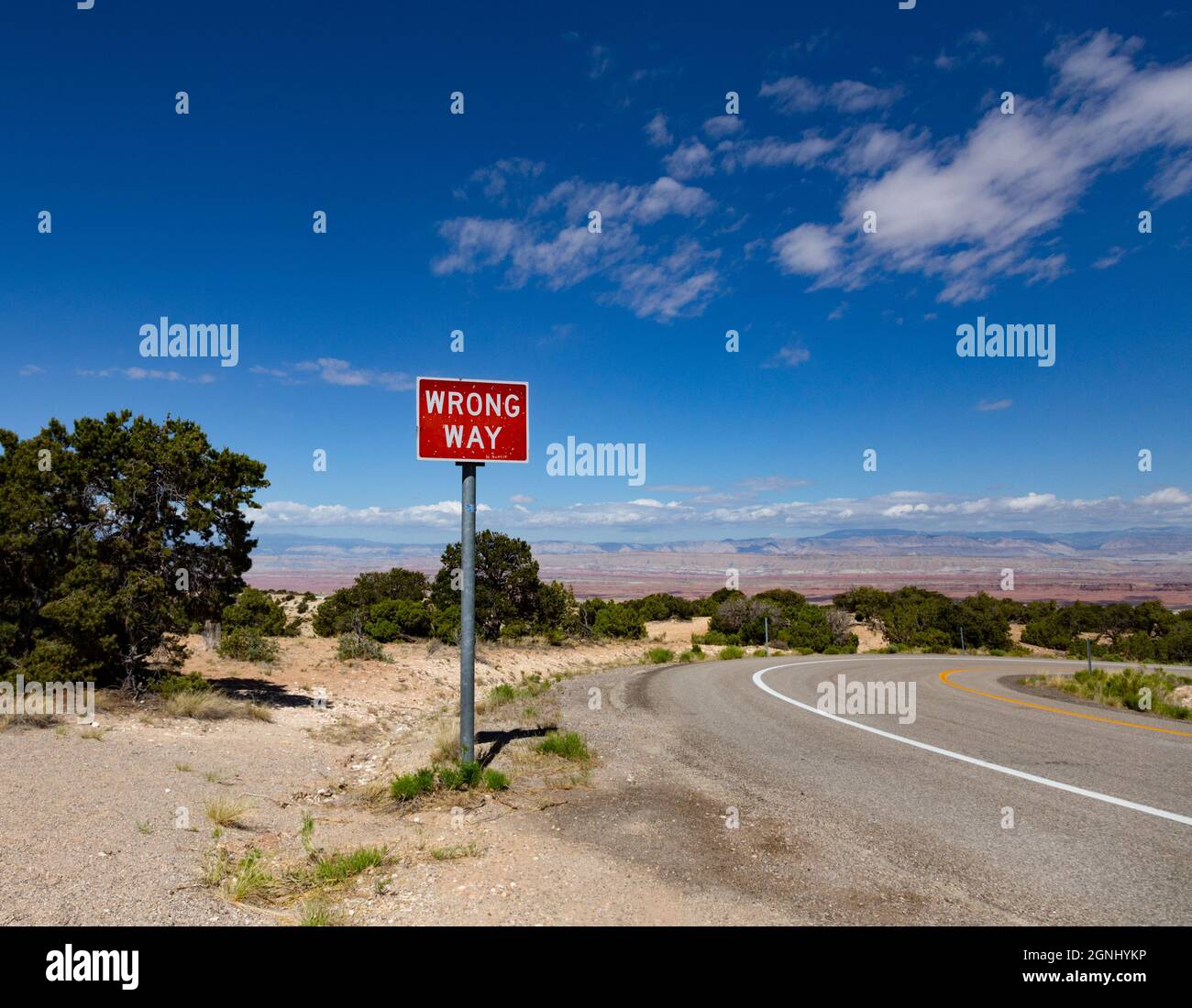 sign showing wrong direction, have you lost your way Stock Photo