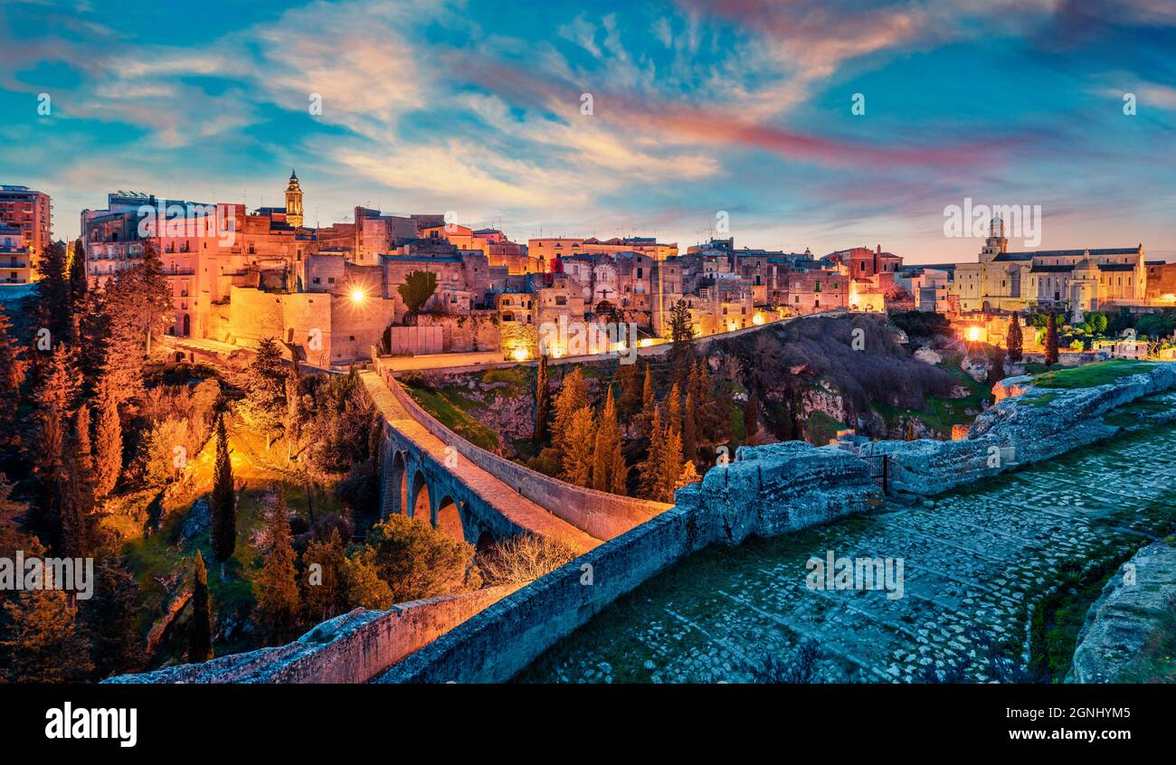 Fantastic spring dawn on Gravina in Puglia tovn. Attractive morning landscape of Apulia, Italy, Europe. Traveling concept background. Stock Photo