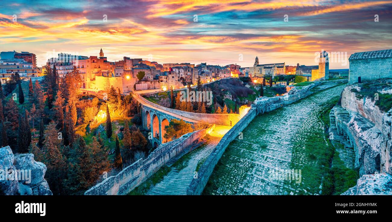 Fantastic spring dawn on Gravina in Puglia tovn. Gorgeous morning landscape of Apulia, Italy, Europe. Traveling concept background. Stock Photo