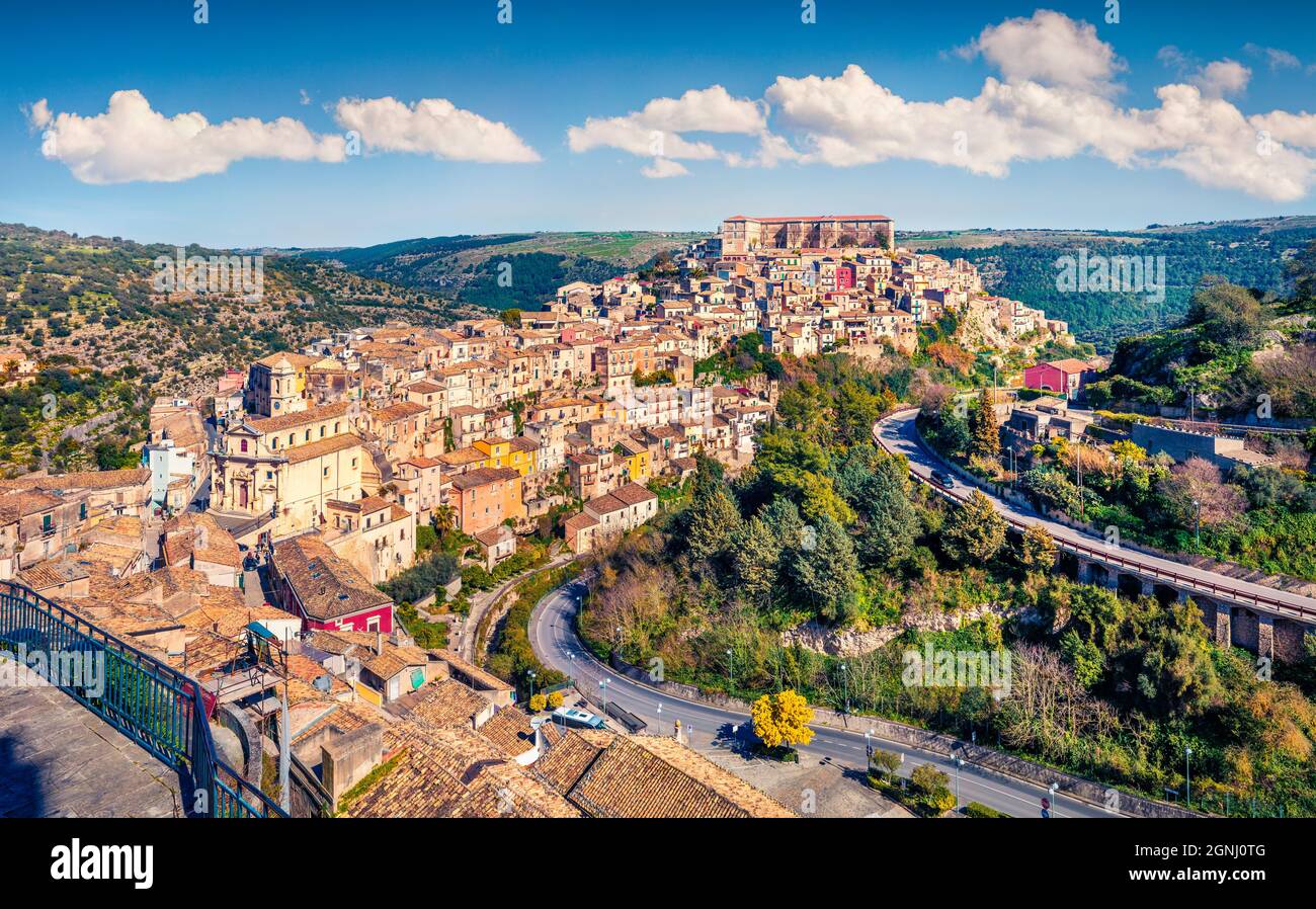 Stunning spring cityscape of Ragusa town with Palazzo Cosentini and Duomo di San Giorgio church on background. Picturesque morning scene of Sicily, It Stock Photo
