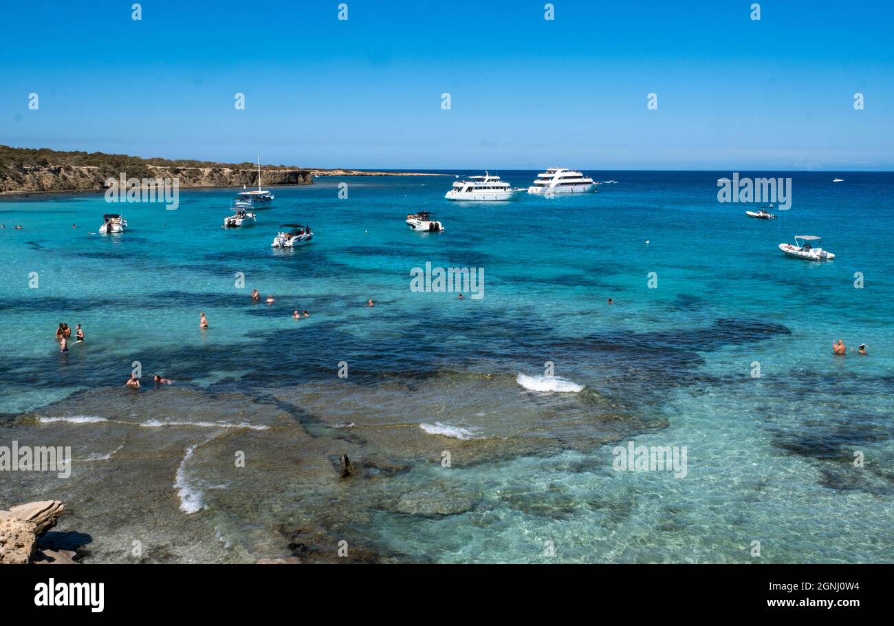 Leisure boats and tourists at the Blue Lagoon on the north coast of the