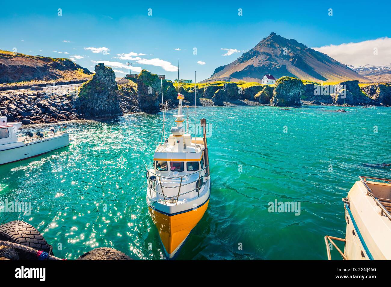 Stunning morning view of small fishing village at the foot of Mt