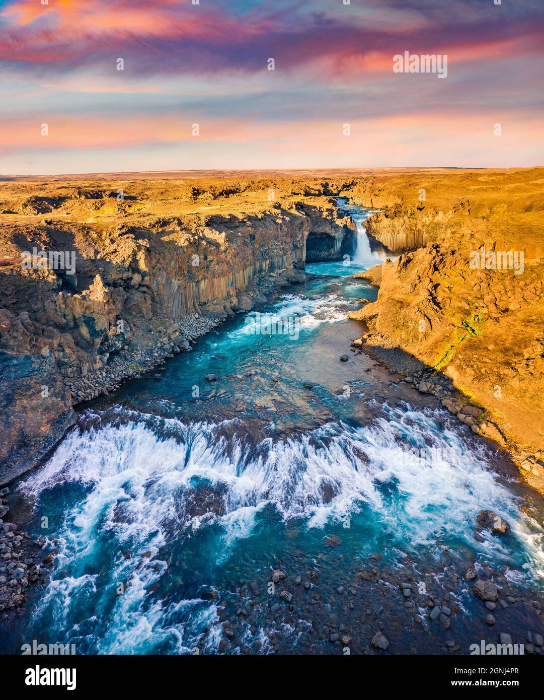 View from flying drone. Sunny summer sunset on Ingvararfoss waterfall.  Colorful evening scene of Iceland, Europe. Beauty of nature concept  background Stock Photo - Alamy