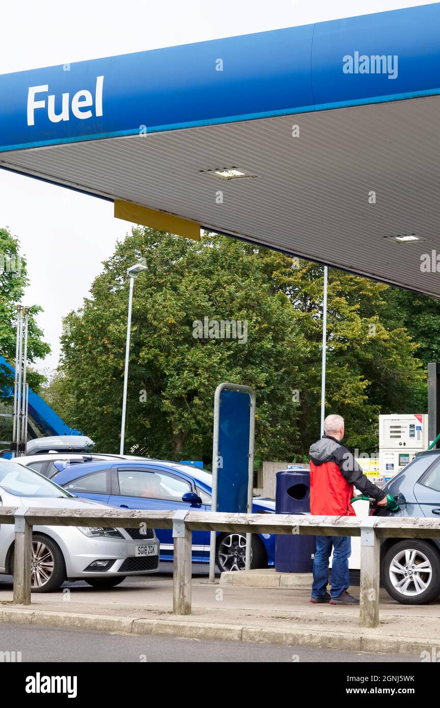 London, England, UK, September 26th 2021, Customer filling car with petrol due to the news media stating the UK was facing a fuel shortage Stock Photo