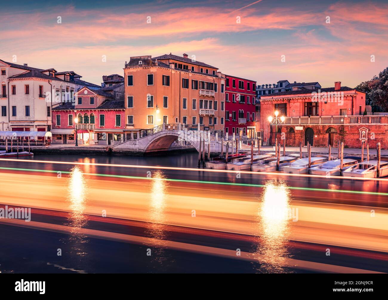 Spectacular morning scene of famous Canal Grande with traces of boat lights.. Splendid summer view of Venice, Italy, Europe. Beautiful morning seascap Stock Photo