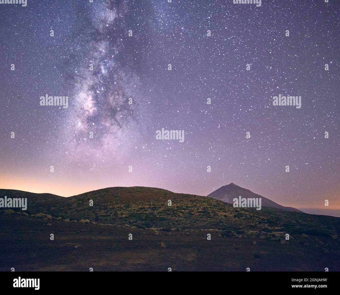 A breathtaking view of the milky way on mountains Stock Photo - Alamy