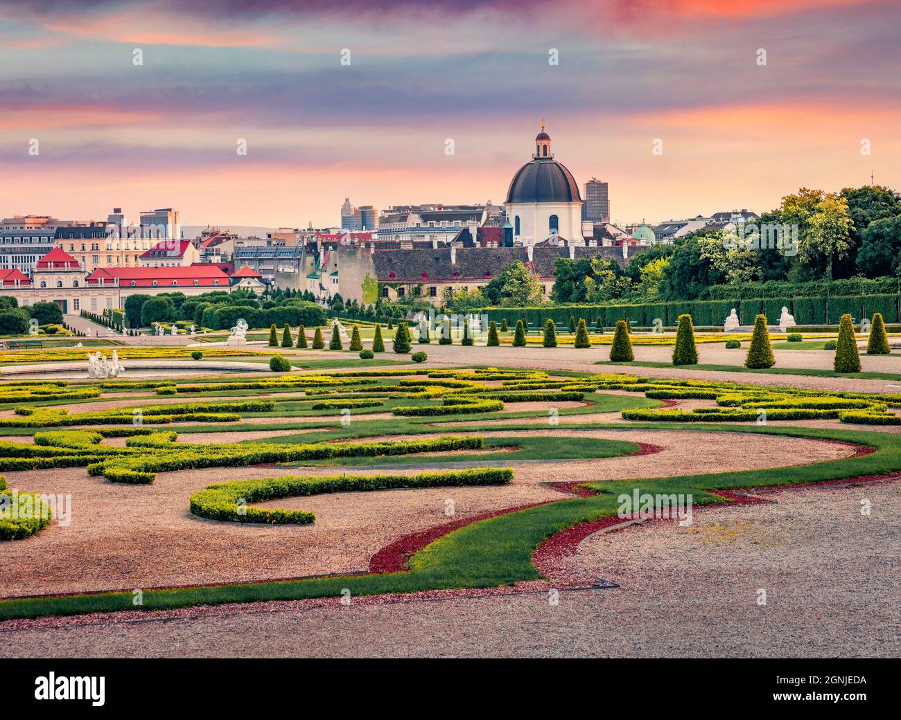 Stunning spring morning in famous Belvedere park, built by Johann Lukas von Hildebrandt for Prince Eugene of Savoy. Sunrise in Vienna with Maria Heims Stock Photo