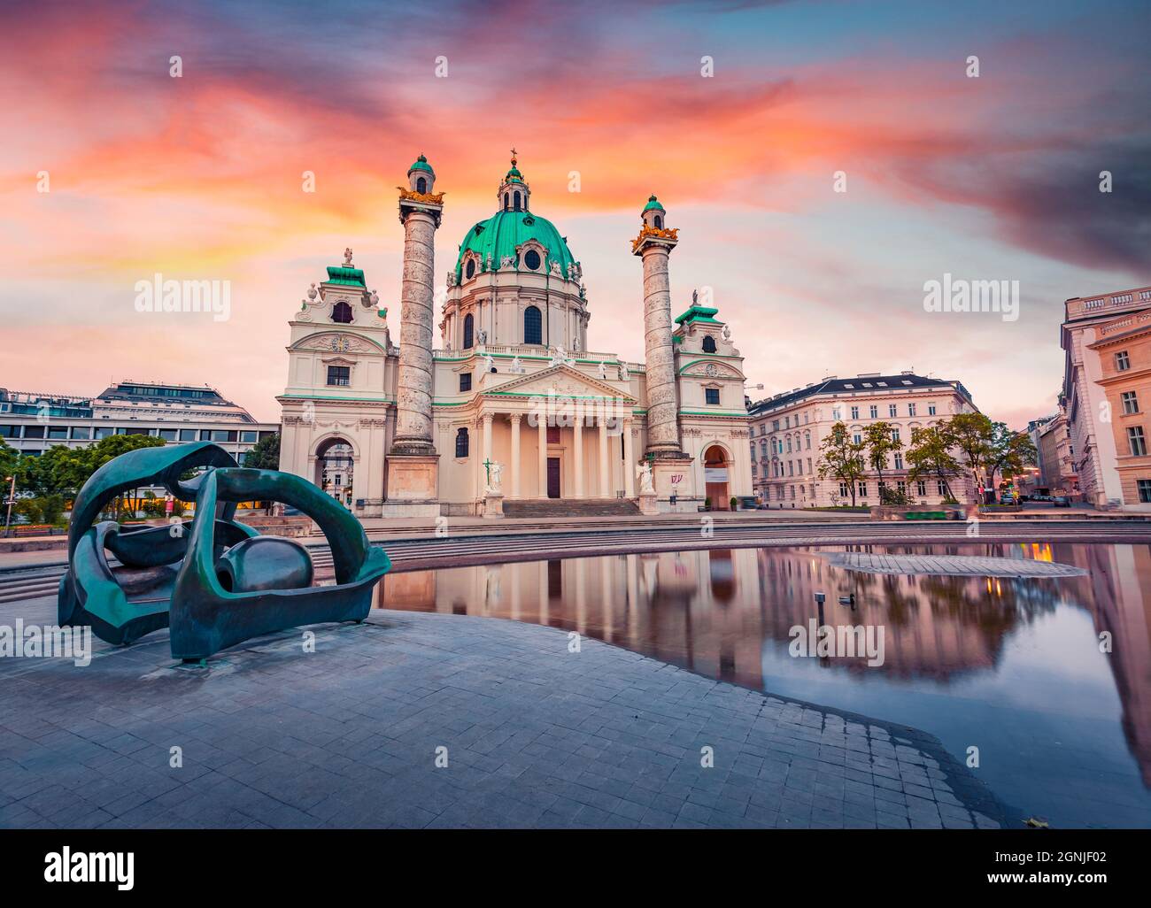 Fantastic spring view of baroque church Karlskirche (St. Charles's Church), the most outstanding baroque church in Vienna. Picturesque sunrise on capi Stock Photo