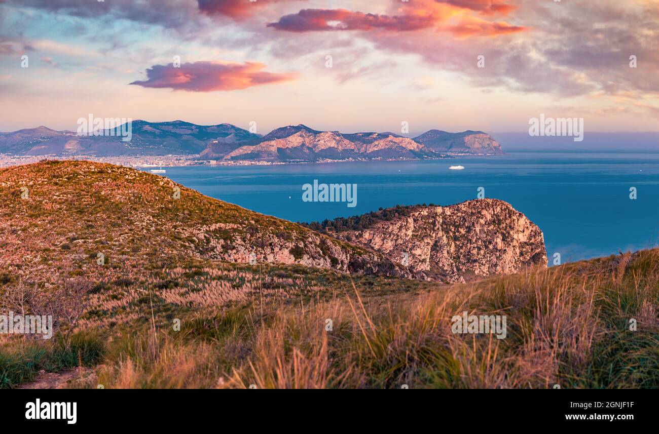 View from flying drone of Palermo port. Colorful spring sunrise on Sicily, Italy, Europe. Stunning seascape of Mediterranena sea. Beautiful landscape Stock Photo