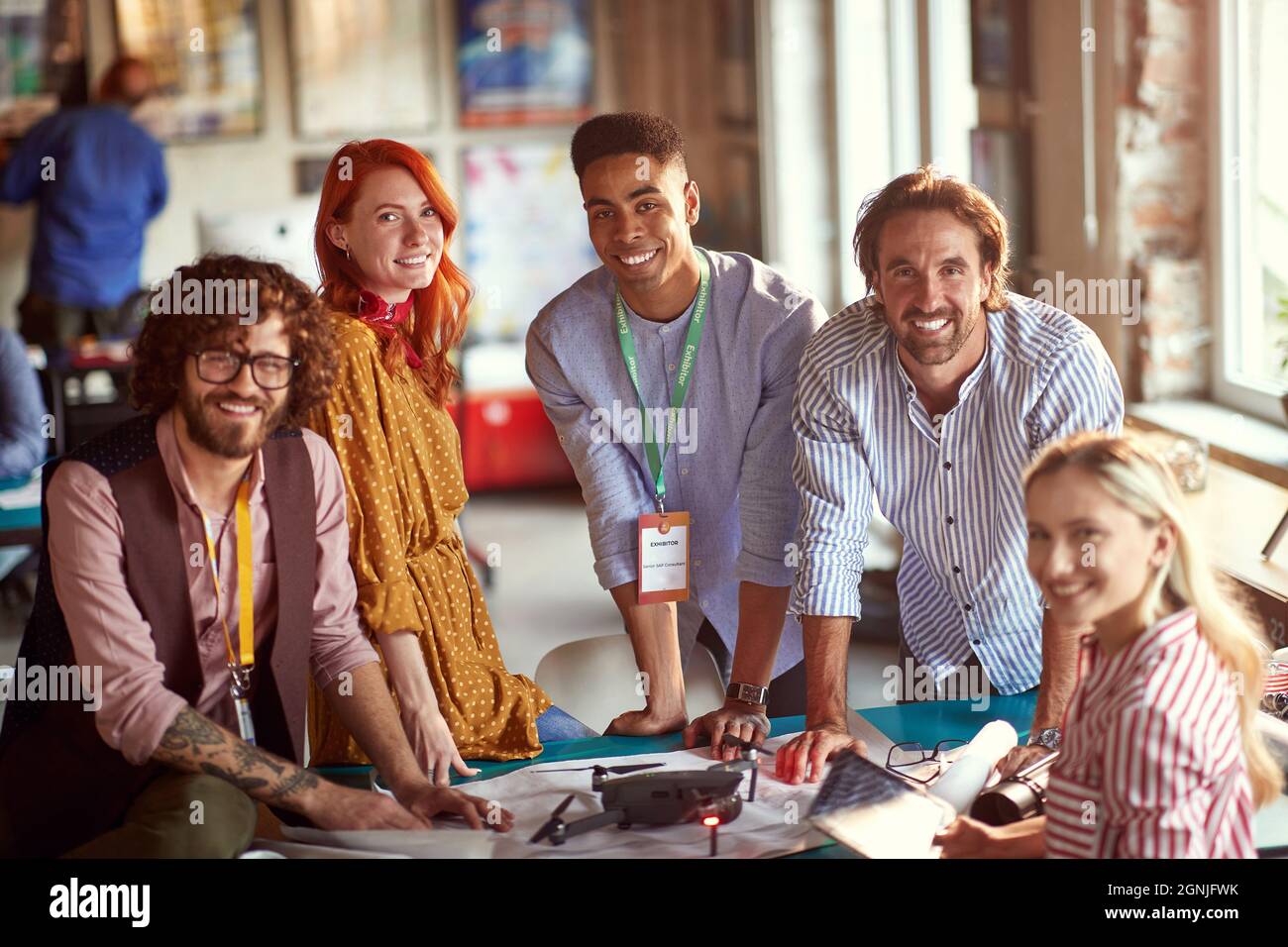 A group of young creative people a relaxed atmosphere in the office are ...