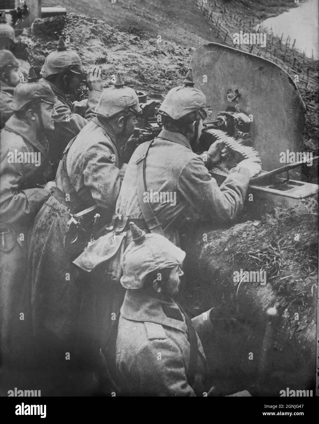 A vintage photo circa 1918 of German soldiers manning fixed machine gun positions on the Western front in France Stock Photo