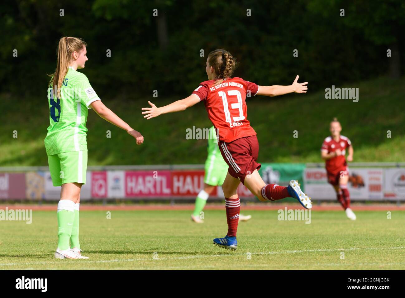 Aschheim, Germany. 26th Sep, 2021. Sarah Ernst (13 FC Bayern Munich II)  celebrates her goal during the 2. Frauen Bundesliga match between FC Bayern  Munich II and VfLWolfsburg II at Sportpark Aschheim,