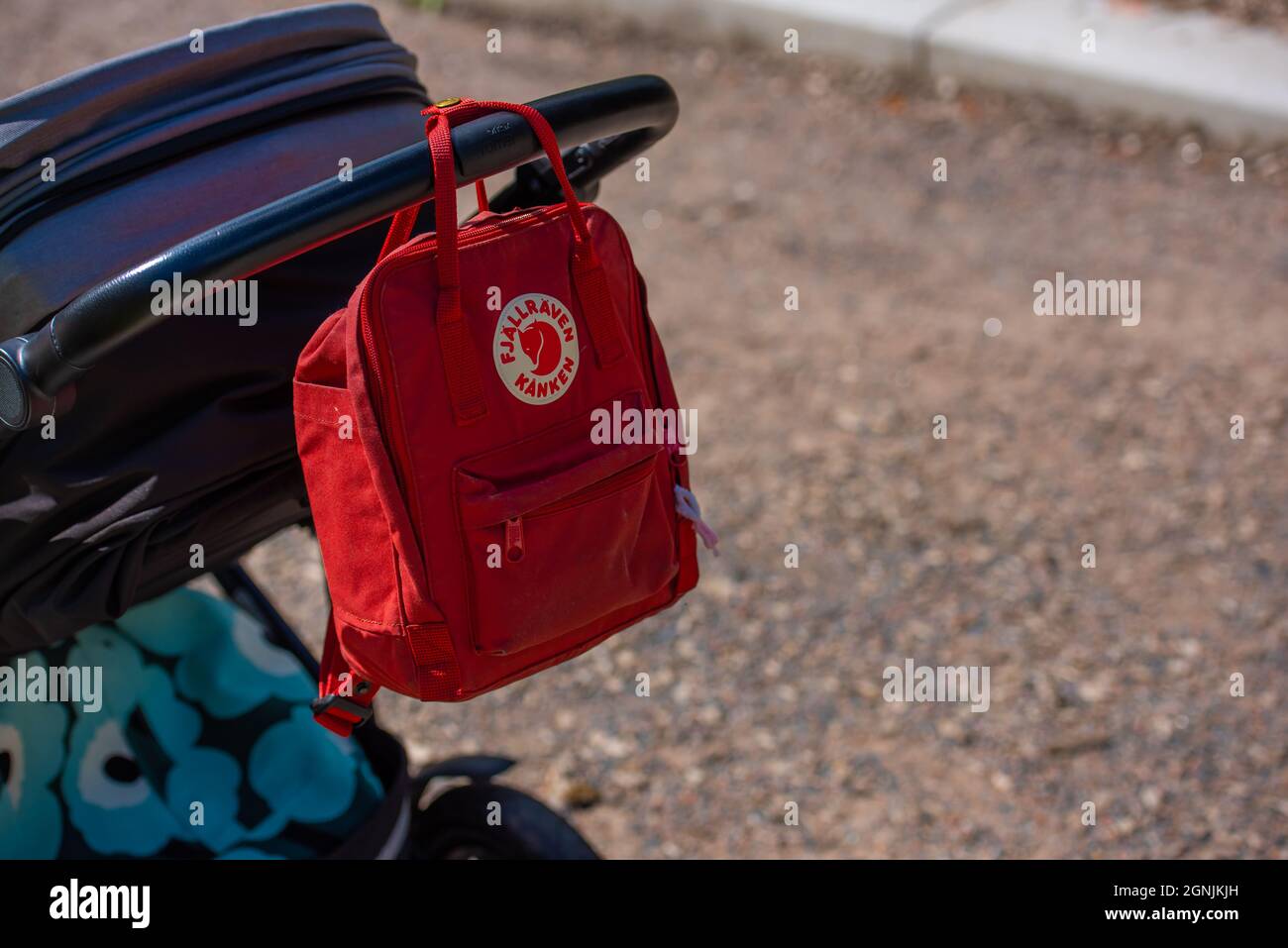 Alingsås, Sweden - August 20 2021: Small red Fjällräven Kånken backpack  hanging from a stroller Stock Photo - Alamy