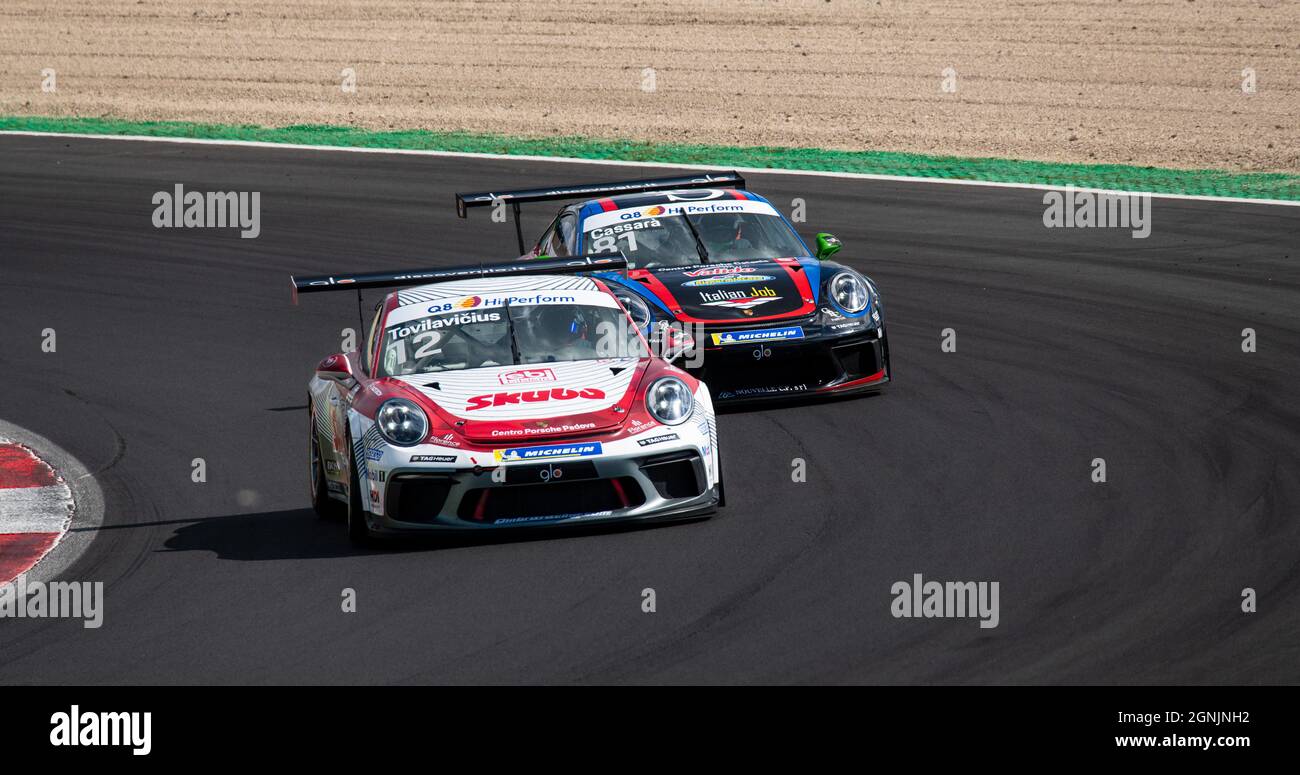 Vallelunga, italy september 19th 2021 Aci racing weekend. Race cars challenging at asphalt circuit turn, scenic view of Porsche Carrera in action Stock Photo
