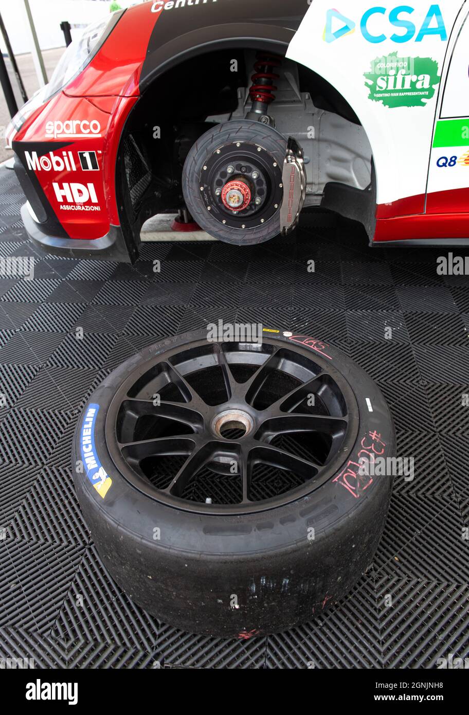Vallelunga, italy september 19th 2021 Aci racing weekend. Unmounted Michelin tire on race car Porsche visible brake mechanical part calliper and disc Stock Photo