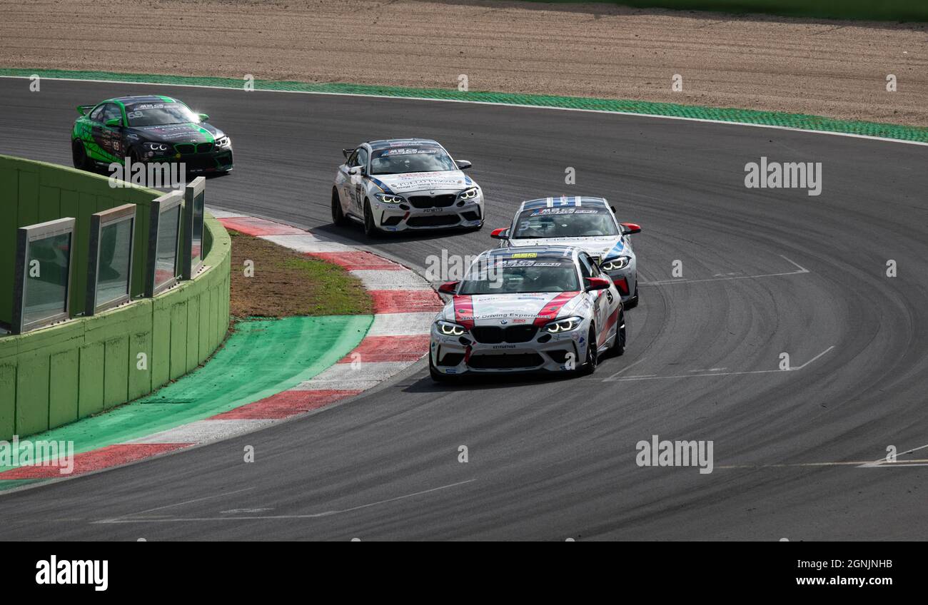 Vallelunga, italy september 19th 2021 Aci racing weekend. Touring racing cars challenging action at turn on circuit track, group of BMW M2 Stock Photo