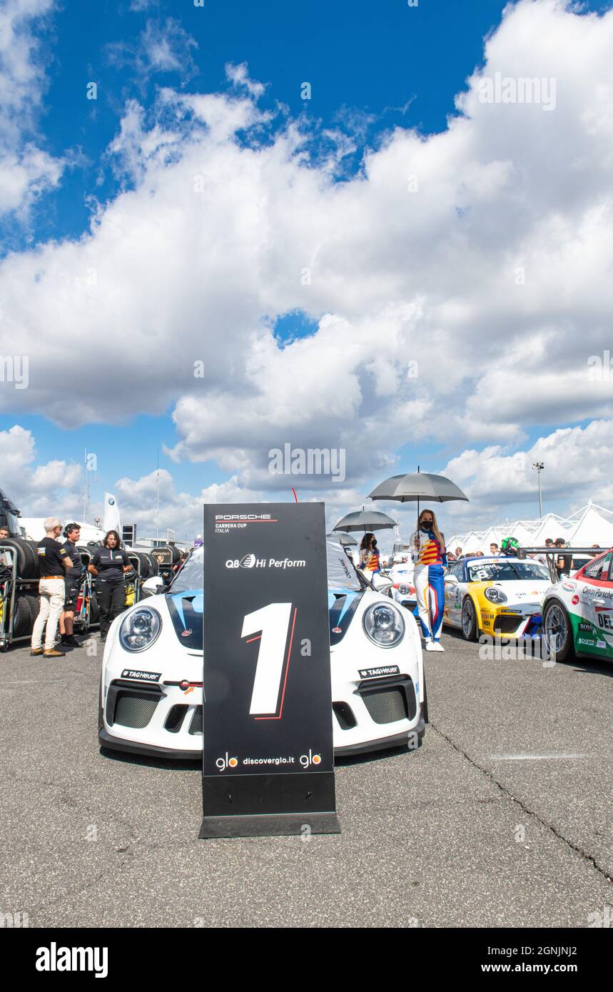Vallelunga, italy september 19th 2021 Aci racing weekend. Many race cars aligned in circuit paddock with number one sign Porsche carrera show Stock Photo