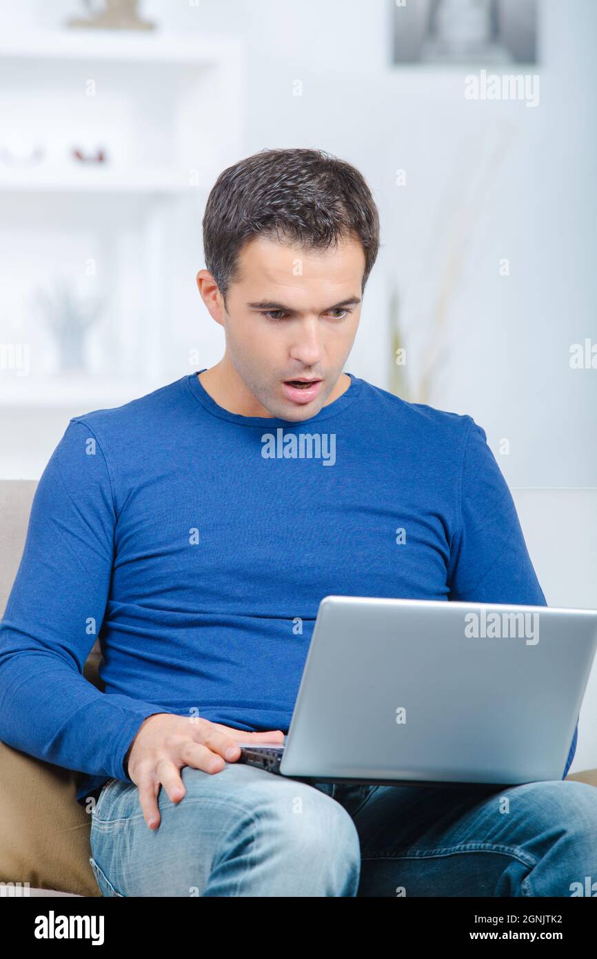 man having trouble with laptop Stock Photo