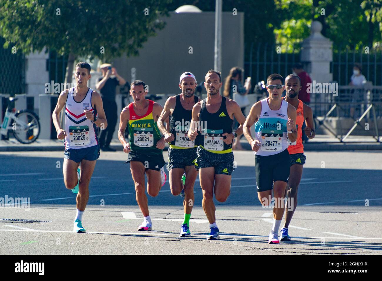 Group of professional athletes walking the streets of Madrid doing the Madrid Half Marathon. Chema Martinez. In Spain. Europe. Horizontal photography. Stock Photo