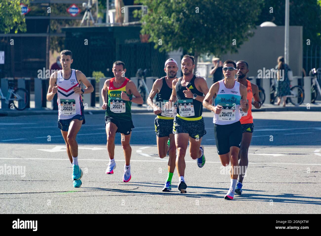 Group of professional athletes walking the streets of Madrid doing the Madrid Half Marathon. Chema Martinez. In Spain. Europe. Horizontal photography. Stock Photo