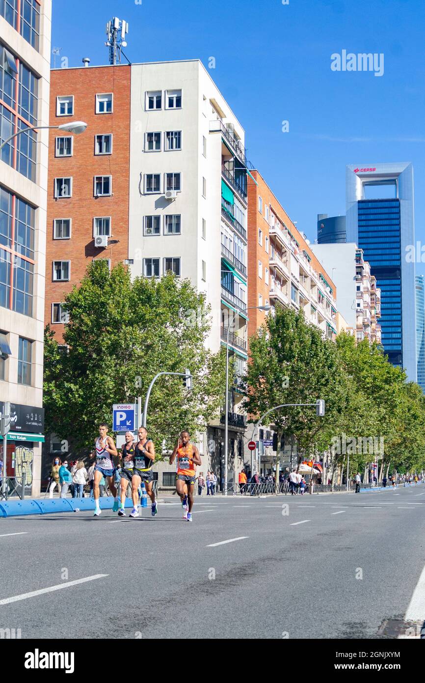 Group of professional athletes walking the streets of Madrid doing the Madrid Half Marathon. Chema Martinez. In Spain. Europe. Horizontal photography. Stock Photo